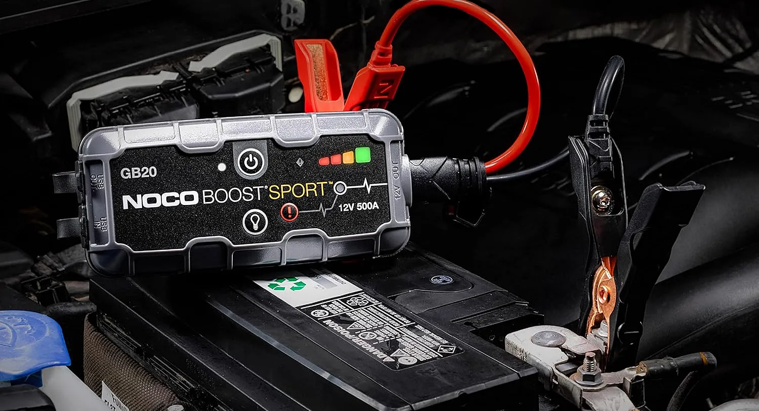 Noco boost sport jumper battery attached to vehicle battery